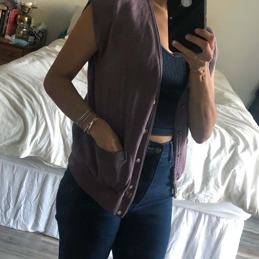 Vintage sweater vest with pockets.